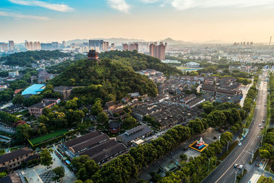 High angle view of street amidst buildings in city