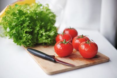 Close-up of tomatoes on cutting board