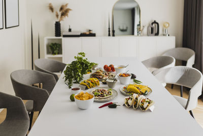 Healthy feast with various mexican food on table