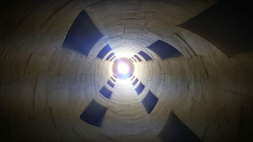 Low angle view of illuminated ceiling