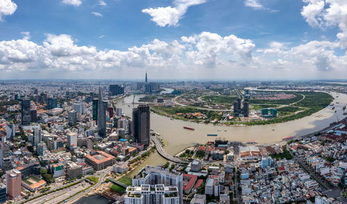 High angle view of modern buildings in city against sky