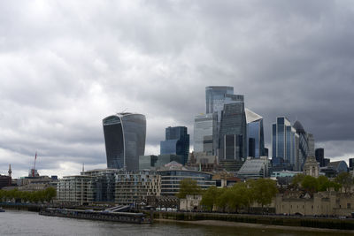 Modern buildings in city against sky