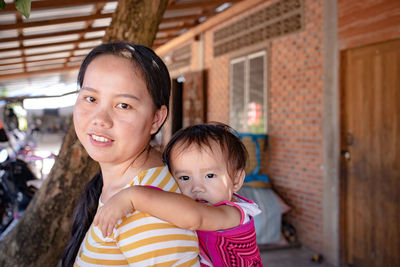 Portrait of mother and daughter