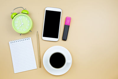 Directly above shot of coffee cup on table