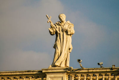 Low angle view of statue against sky