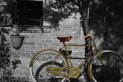 Bicycle parked by building