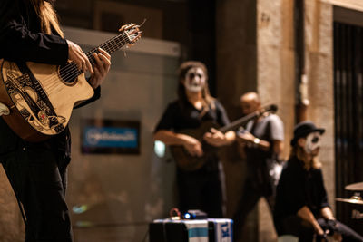 People playing guitar