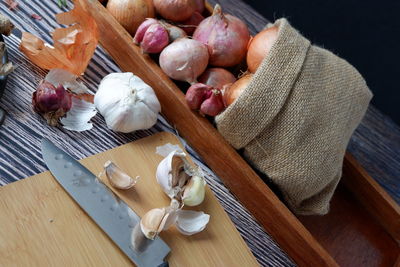 High angle view of eggs on cutting board