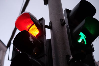 Low angle view of illuminated road signal