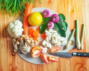 High angle view of chopped fruits on cutting board