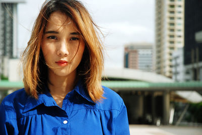 Portrait of beautiful woman with tousled hair