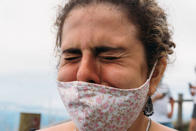 Close-up portrait of a girl wearing face mask