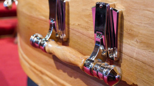 Close-up of guitar on table