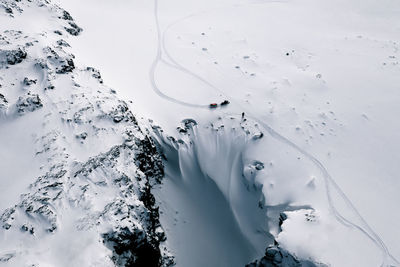 High angle view of snow covered land