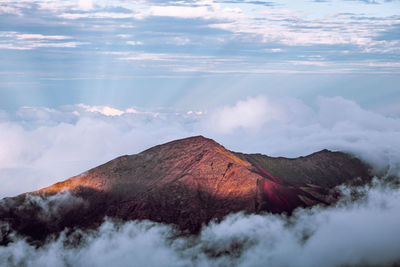 Panoramic view of volcanic landscape against sky