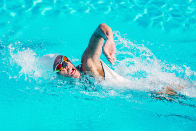 Woman swimming in pool