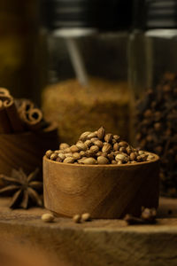 Close-up of roasted coffee beans on table