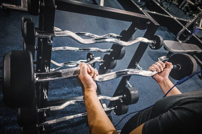 Close-up of a man lifting weights