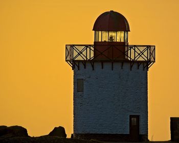 Building against sky during sunset