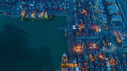 High angle view of container ship at commercial dock