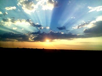 Scenic view of silhouette landscape against sky during sunset