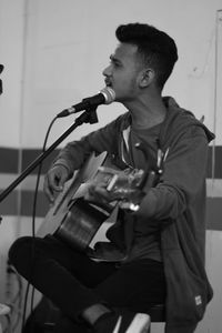 Young man playing guitar