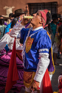 Group of people in traditional clothing during festival