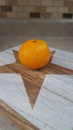 Close-up of orange on table