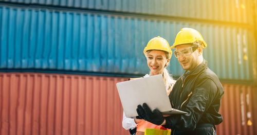 Young man working with mobile phone
