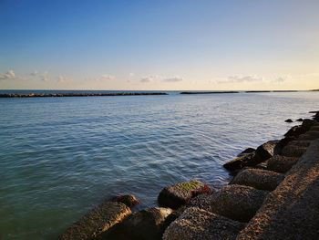 Scenic view of sea against sky during sunset... 