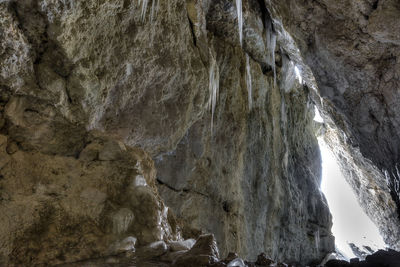 Low angle view of rock formations in cave