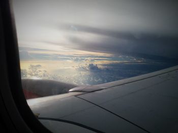 Aerial view of sky seen through airplane window