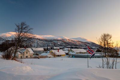 Scenic view of snow covered mountain against sky during winter