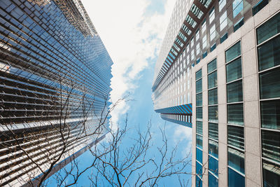 Low angle view of modern buildings against sky