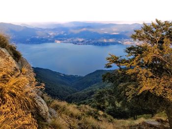 High angle view of trees and mountains against sky
