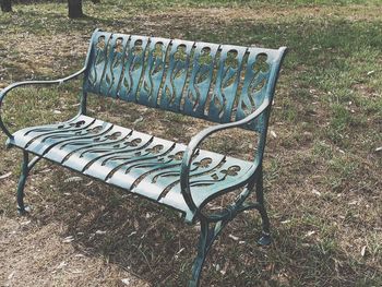 High angle view of empty bench in park