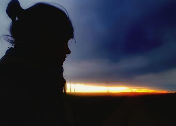 Silhouette of man at sunset