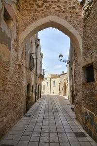 Entrance arch in irsina, a old town of matera province, italy.