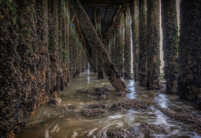 Low angle view of pier at sea