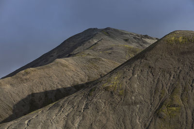 Low angle view of mountain against sky