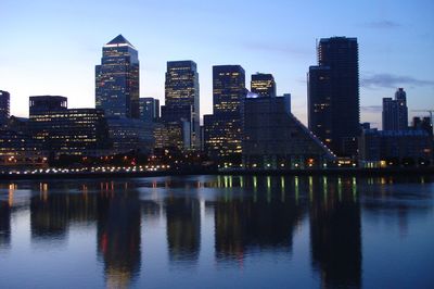 View of city lit up at waterfront