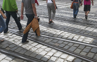 Low section of people standing on railway station