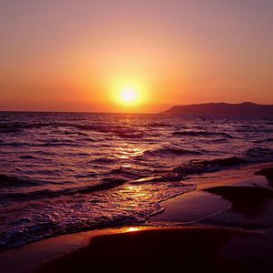 Scenic view of sea at sunset