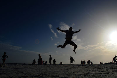 People enjoying at sunset