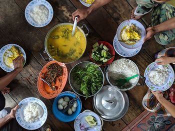 High angle view of people on table