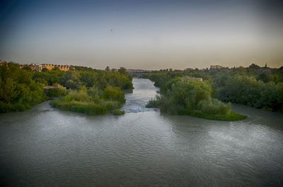 Scenic view of river against sky