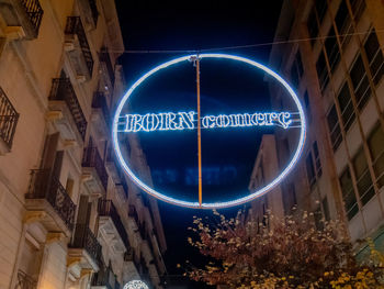 Low angle view of illuminated building at night