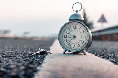 Close-up of clock on table