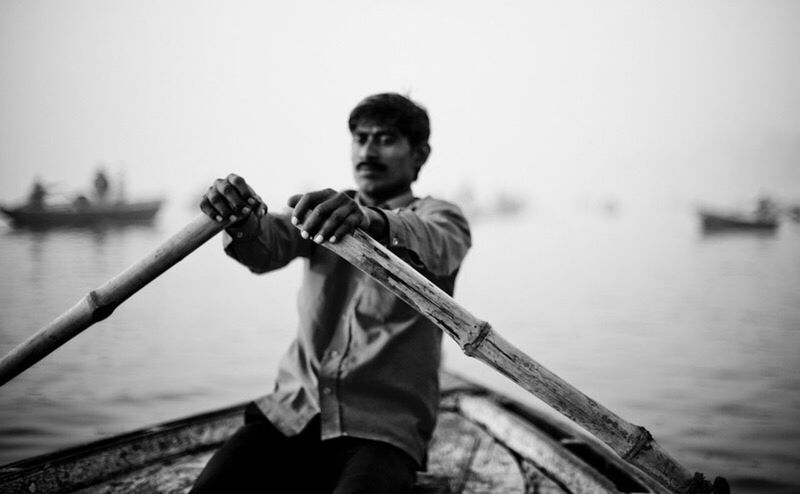 water, nautical vessel, lifestyles, leisure activity, photography themes, boat, holding, focus on foreground, casual clothing, camera - photographic equipment, photographing, sea, transportation, connection, river, sailing, hobbies, ship, day, weekend activities