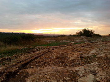 Scenic view of landscape at sunset